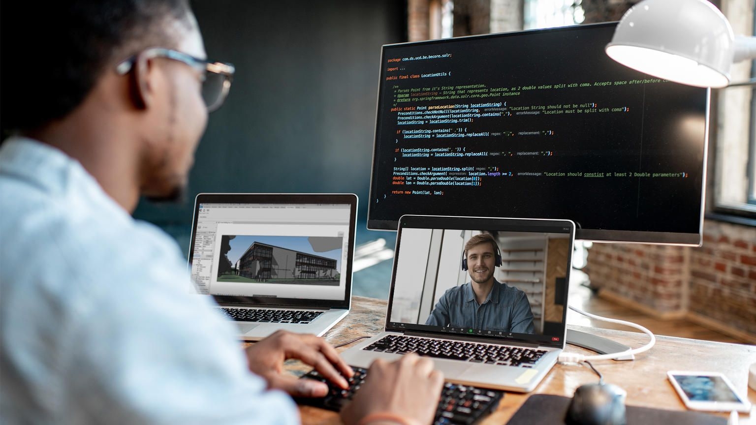 Essential success, man at computer