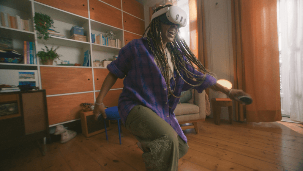 African American women in action, smiling, while wearing Meta Quest 3 headset in living room interior