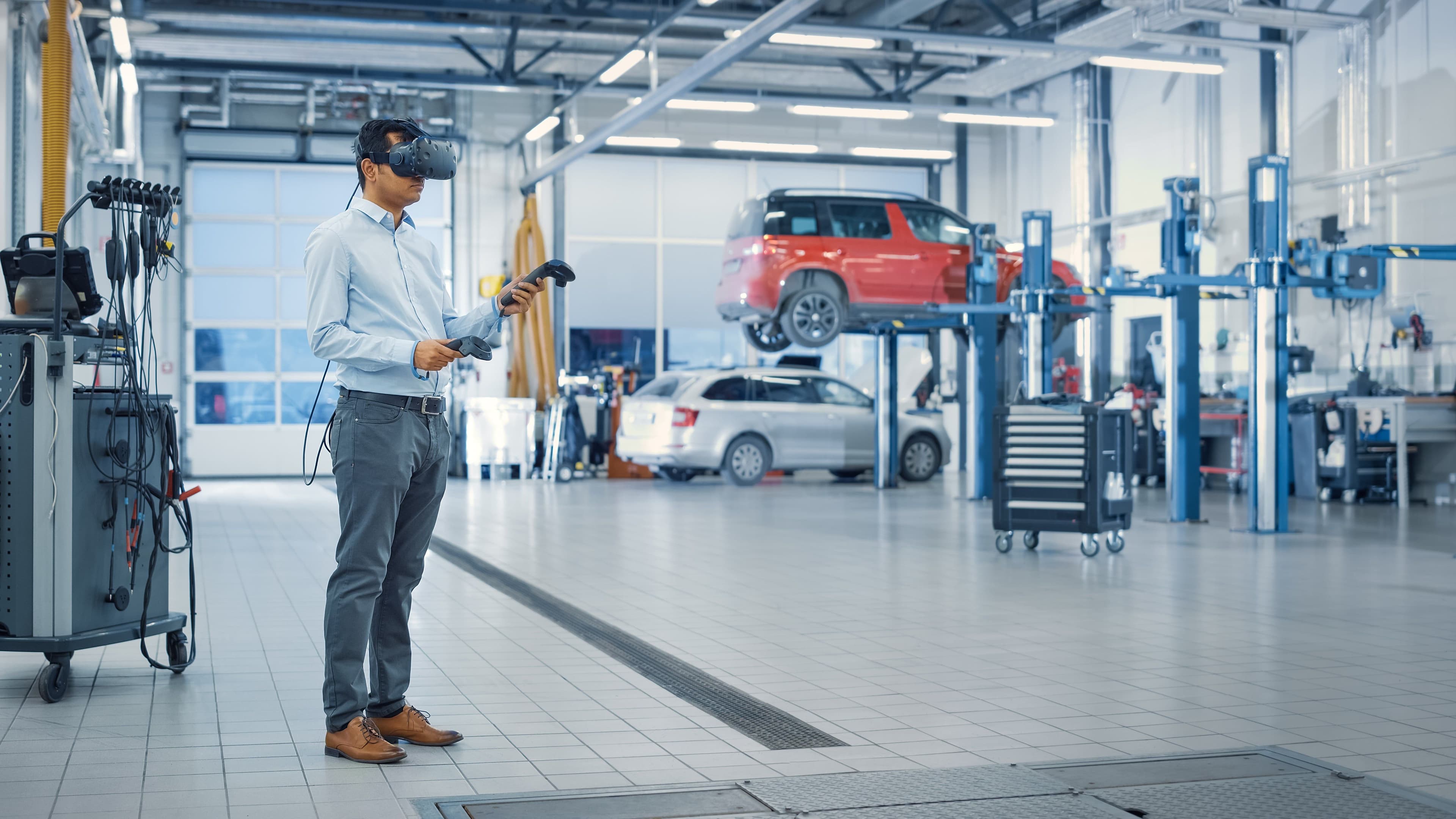 An automotive engineer using a VR headset.